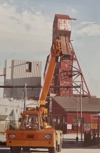Broderson carry deck crane moving equipment on a mining site