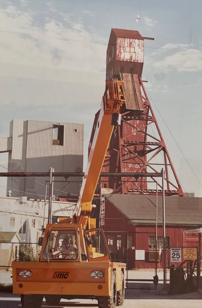 Broderson carry deck crane moving equipment on a mining site